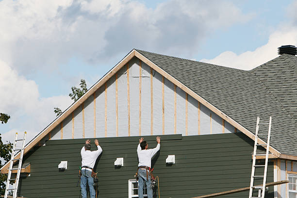 Professional Siding Contractor technician working in Auburn, NY
